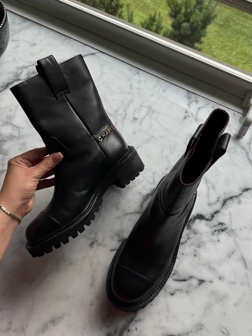 CHANEL Black Leather Lug-Sole Mid-Calf Combat boots